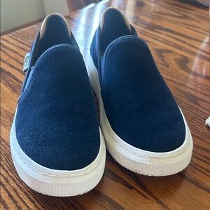 UGG, Women’s Navy slip ons.